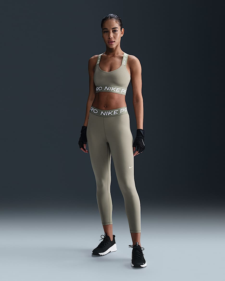 Nike Pro Women s Mid Rise Crop Mesh Panel Leggings. Nike IE